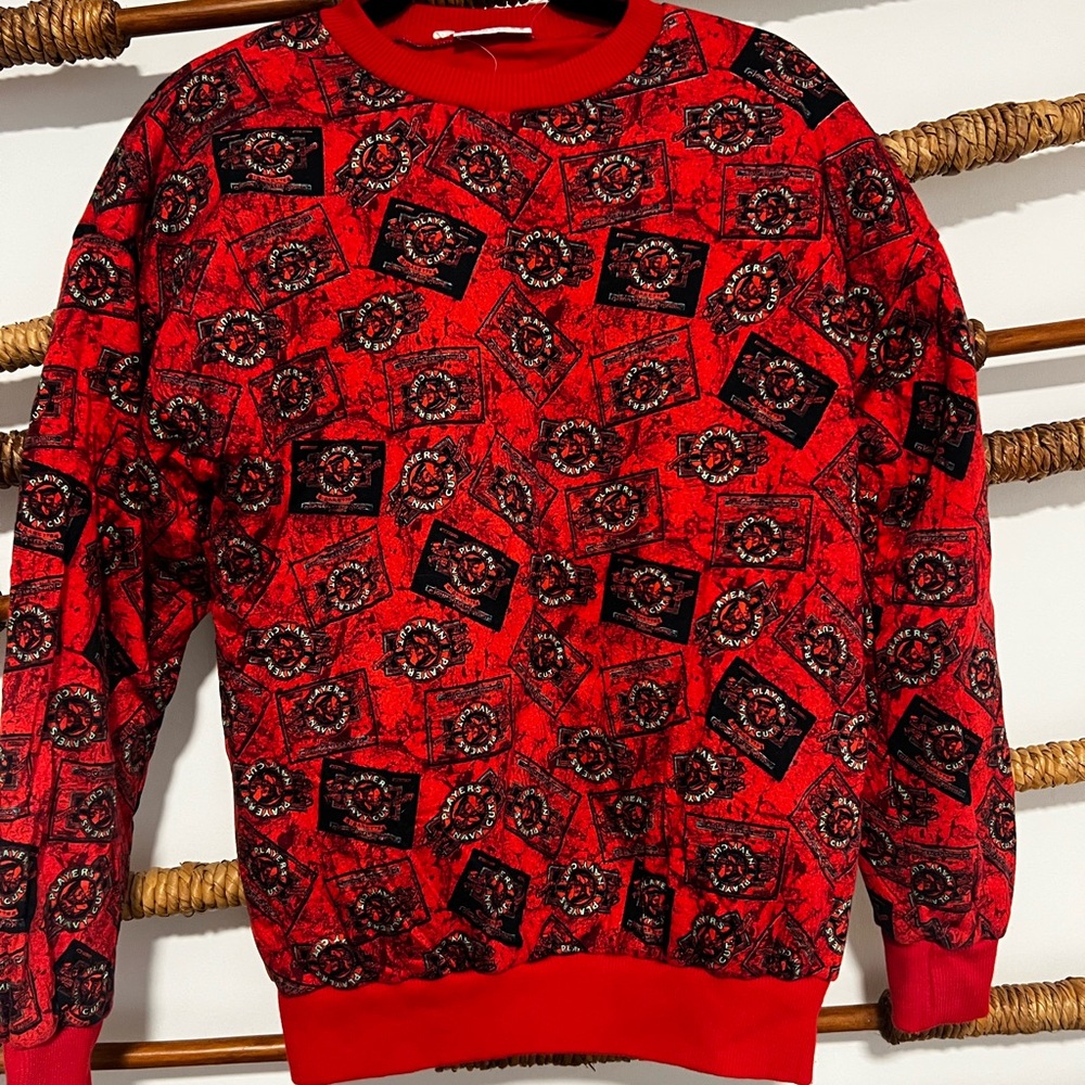 Bold Red and Black Crewneck Sweater with Floral Design